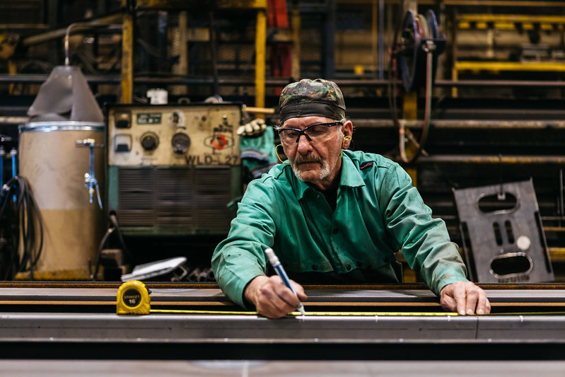 A man working in an industrial environment.
