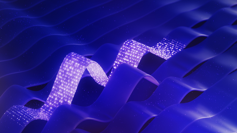 Abstract blue waves flowing across a dark background, with a glowing ribbon of small white lights weaving through the center.